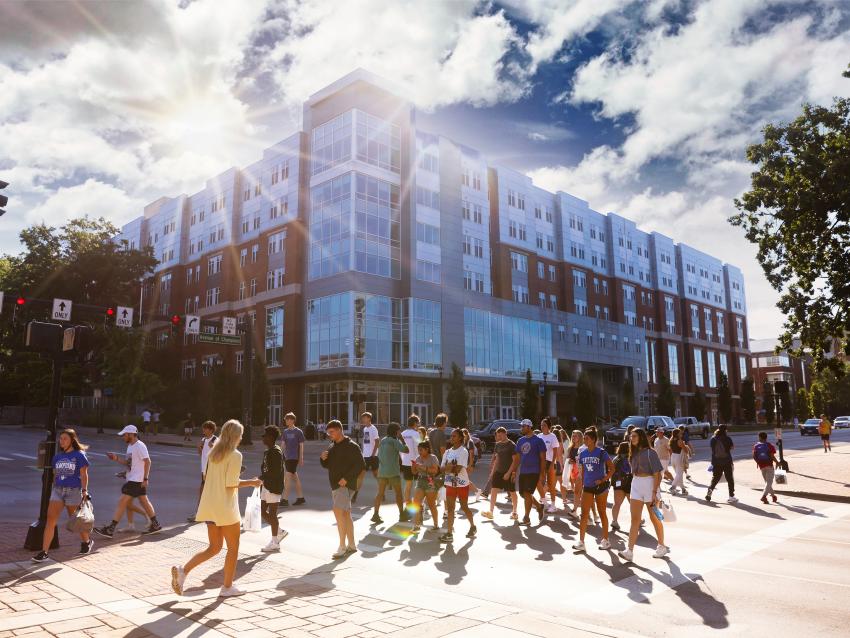 This is a photo of students walking on the University of Kentucky campus. 