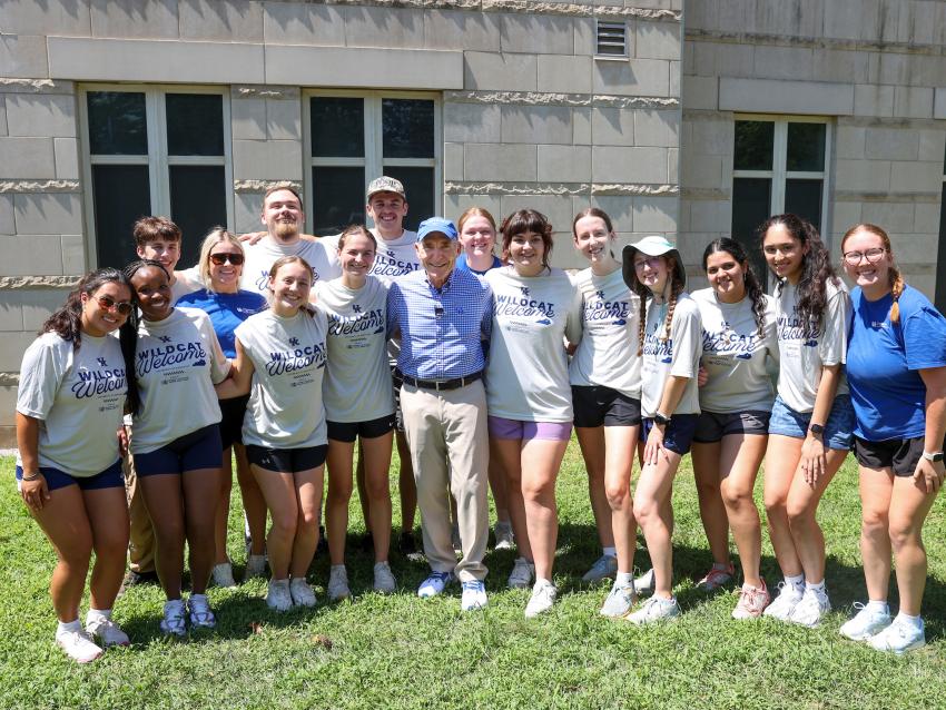 UK President Eli Capilouto poses with peer mentors at Pigman Hall during Big Blue Move-in 2025.