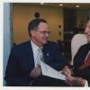 President Lee Todd (left) is talking with Thomas D. Clark (right)  at Dr. Thomas D. Clark's 100th birthday celebration at Young Library          President Lee Todd (left) is talking with Thomas D. Clark (right)  at Dr. Thomas D. Clark's 100th birthday celebration at Young Library